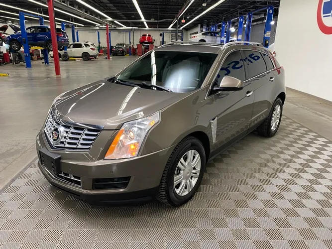 Used 2014 Cadillac SRX Luxury Collection with VIN 3GYFNBE30ES561321 for sale in Wichita, KS